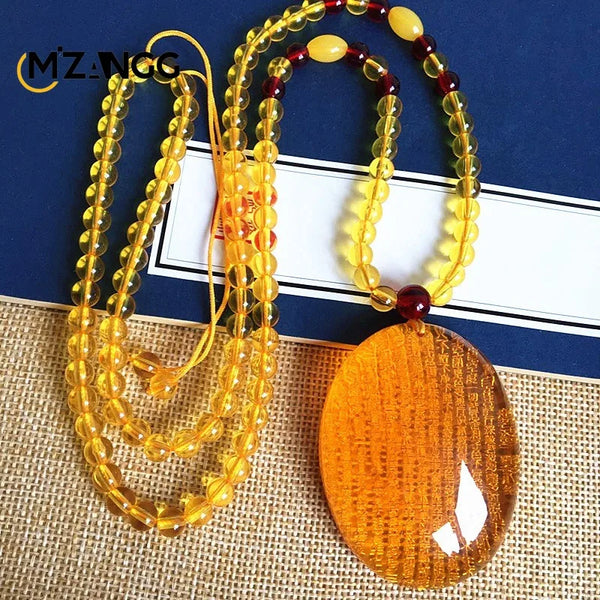 Gold Amber Buddha Pendant-ToShay.org